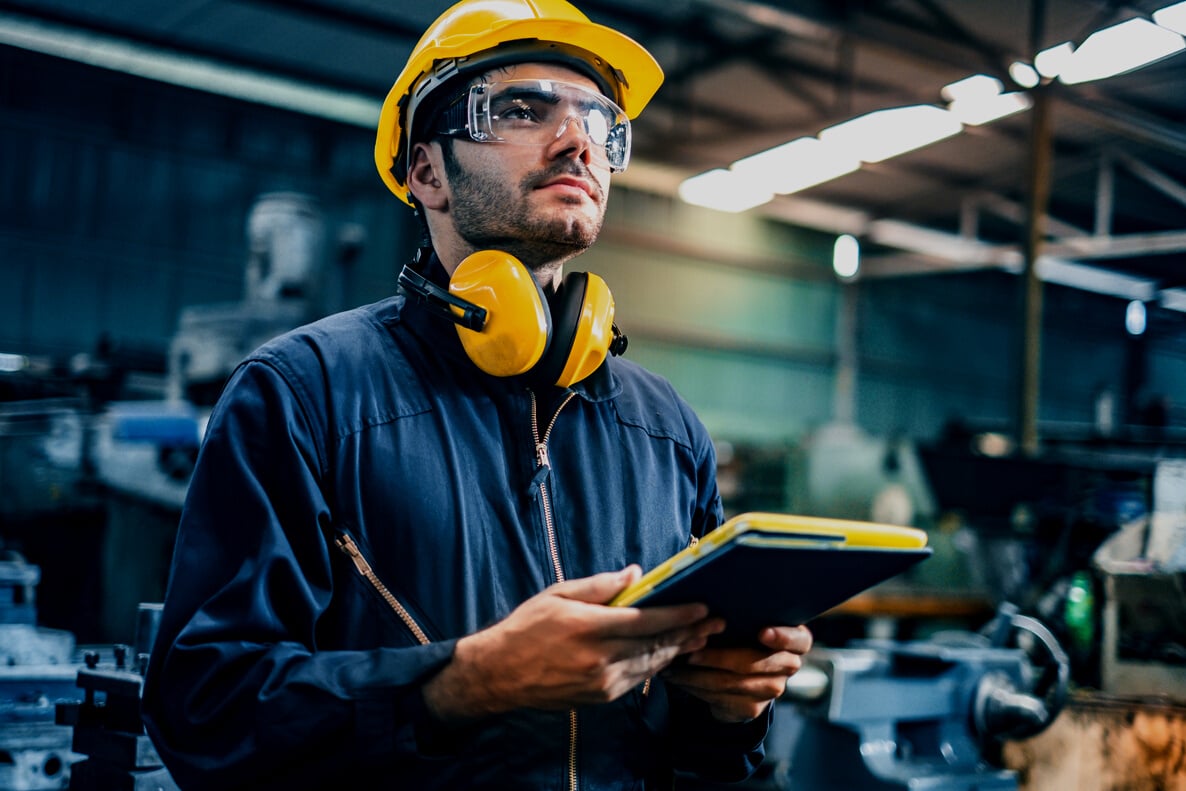 Industrial Engineers in Hard Hats.Work at the Heavy Industry Man